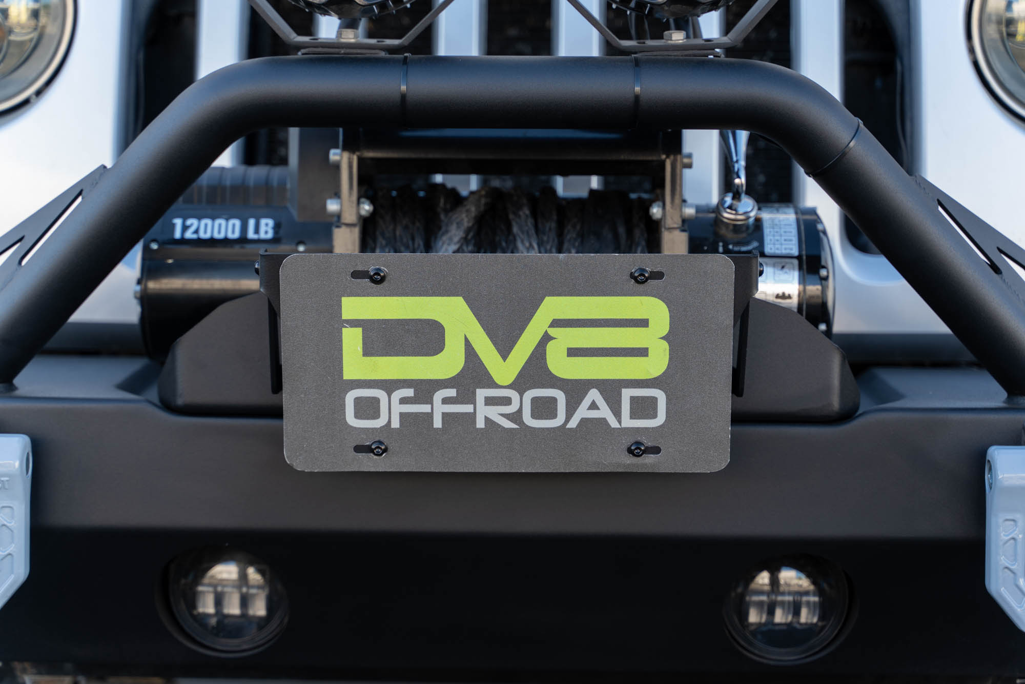 DV8 Offroad Fairlead Mounted Flip-Up License Plate Bracket LPBM-02