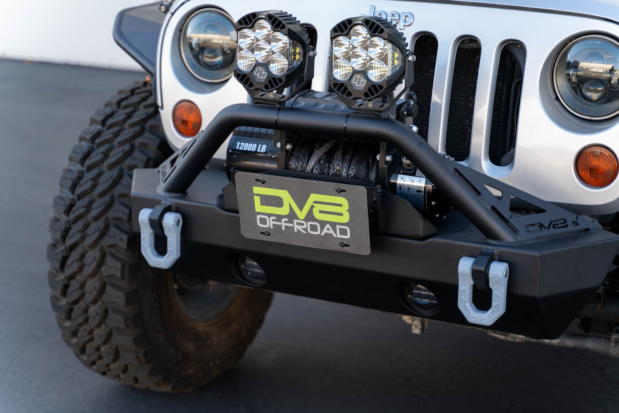 DV8 Offroad Fairlead Mounted Flip-Up License Plate Bracket LPBM-02