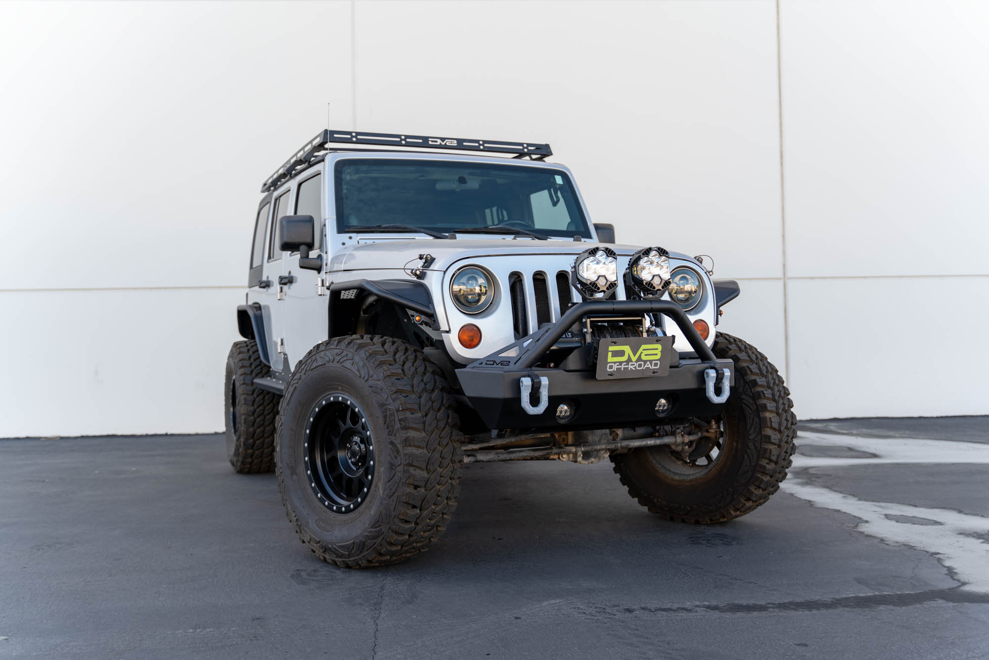 DV8 Offroad Fairlead Mounted Flip-Up License Plate Bracket LPBM-02