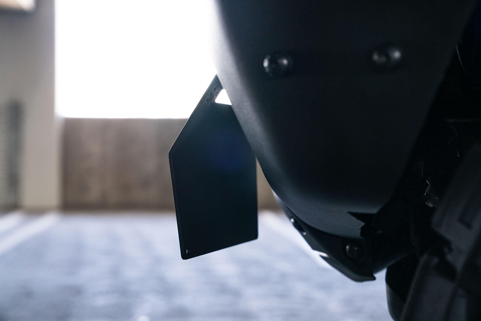 DV8 Offroad Front license plate relocation bracket places plate to the side of the bumper. LPBR-02