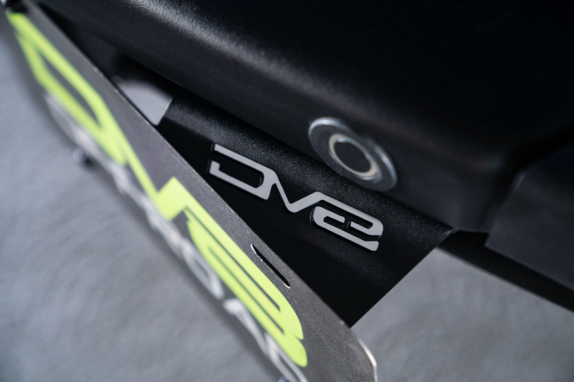 DV8 Offroad Front license plate relocation bracket places plate to the side of the bumper. LPBR-02