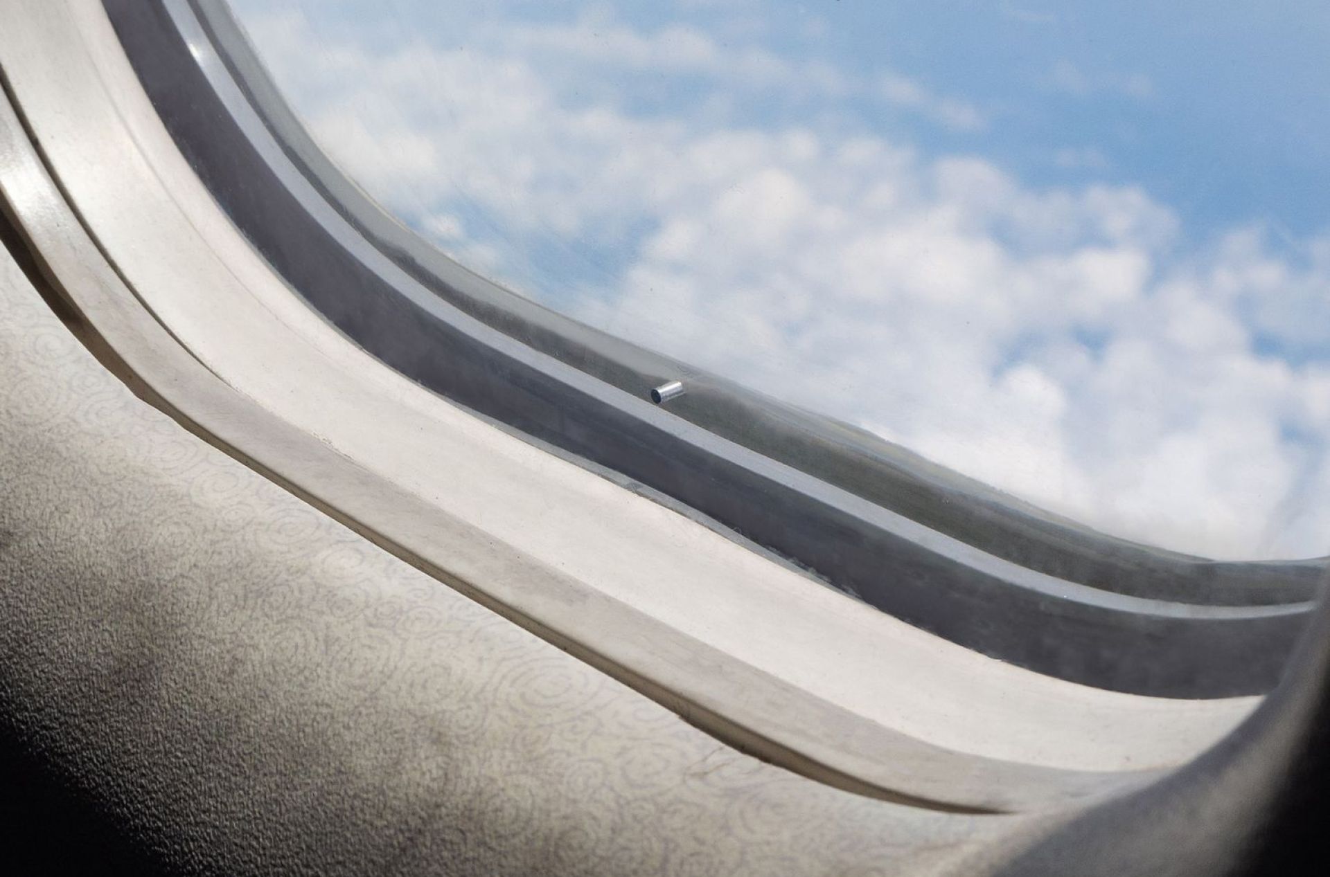 The Real Reason Why Airplane Windows Have Holes The Real Reason Why Airplane Windows Have Holes