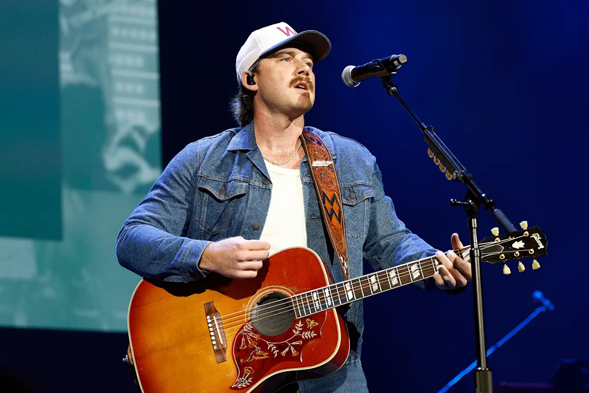 Morgan Wallen Aims Middle Finger at Charley Crockett Shirt Held by Gavin Adcock Morgan Wallen Aims Middle Finger at Charley Crockett Shirt Held by Gavin Adcock