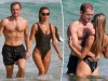 Brooks Nader y Taron Egerton se dan un chapuzón durante una romántica cita en la playa de Australia
