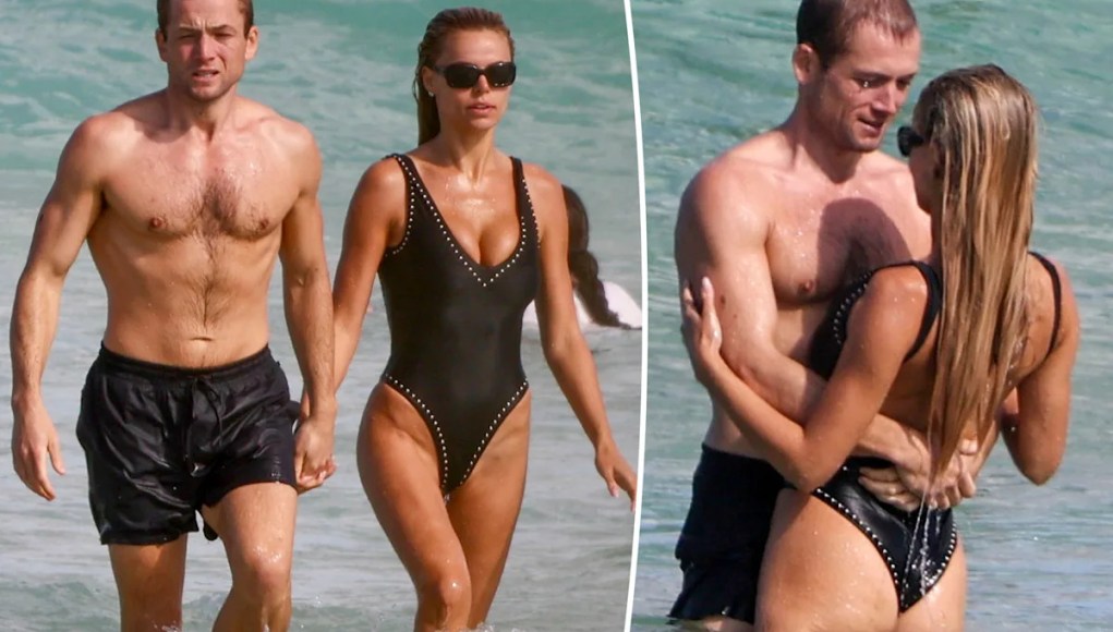 Brooks Nader y Taron Egerton se dan un chapuzón durante una romántica cita en la playa de Australia Brooks Nader y Taron Egerton se dan un chapuzón durante una romántica cita en la playa de Australia