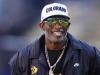 Deion Sanders busca al falso Louis de vacaciones con WAG Karrueche Tran y su hijo