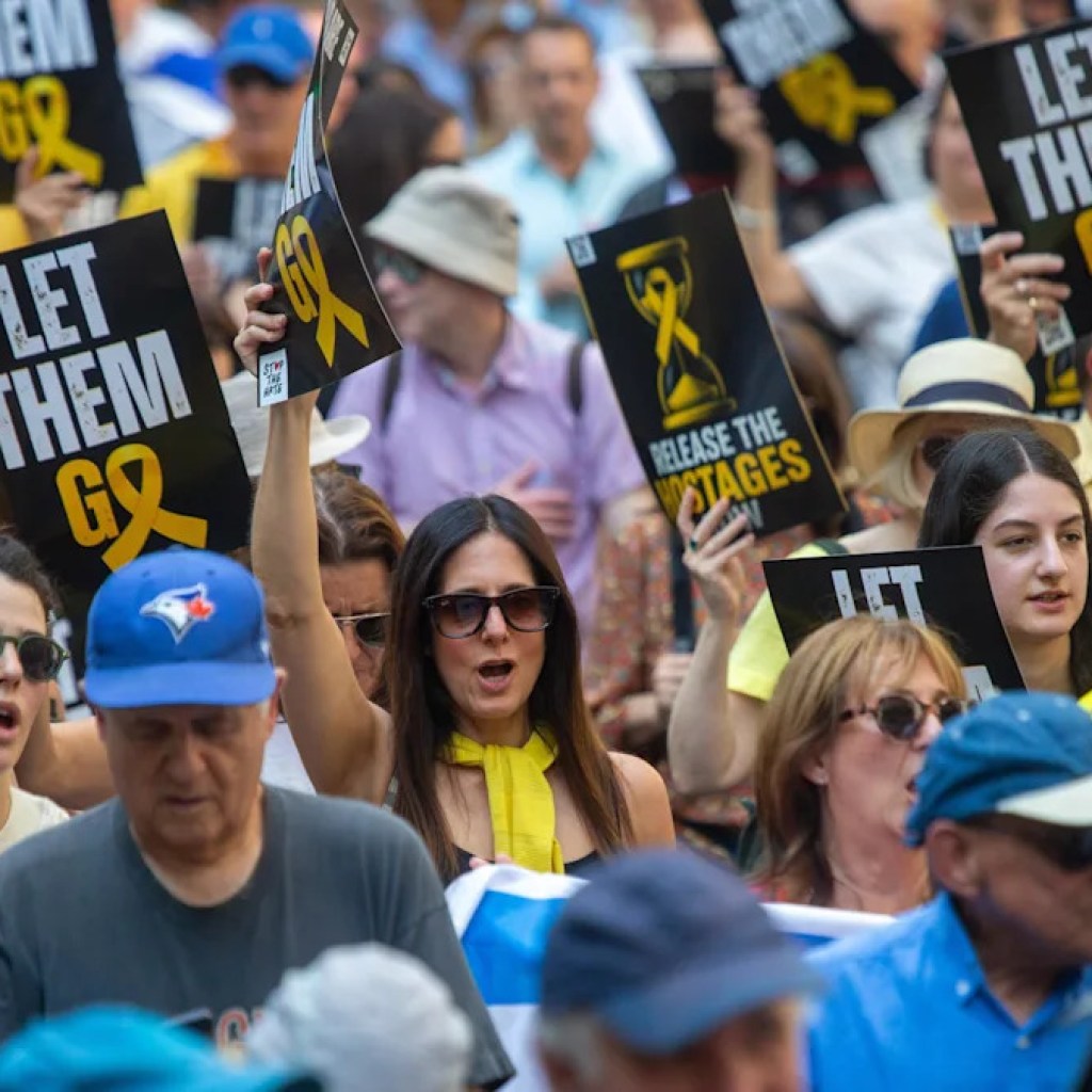 Tons of march via London in pro-Israel protest Tons of march via London in pro-Israel protest