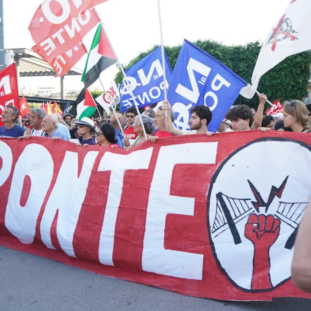 Hundreds march towards plan to construct large bridge linking Sicily to Italy’s mainland Hundreds march towards plan to construct large bridge linking Sicily to Italy’s mainland