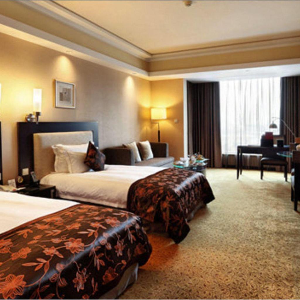 Ningbo Nanyuan Hotel dia manome traikefa tsy manam-paharoa izay miandry anao ao Ningbo. Famakafakana trano fandraisam-bahiny Ningbo Nanyuan Hotel dia manome traikefa tsy manam-paharoa izay miandry anao ao Ningbo. Famakafakana trano fandraisam-bahiny