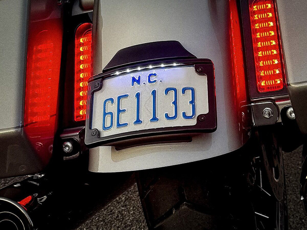 Custom Dynamics Curved Number Plate Frame with Number Plate Light Only – Black. Fits CVO Touring 2023up & Street Glide & Road Glide 2024up