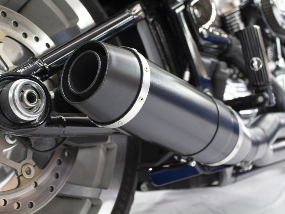 D&D EXHAUST Bob Cat 2-into-1 Exhaust – Black with Black Satin Sleeve Muffler. Fits Breakout & Fat Boy 2018up & FXDR 2019up.