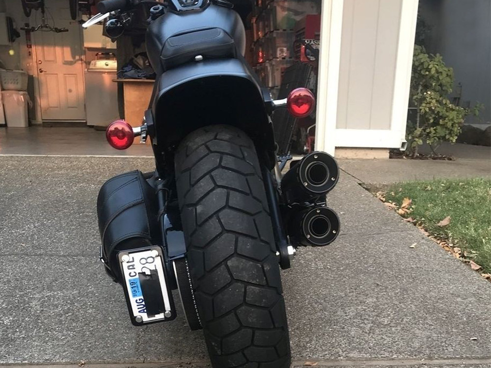 Custom DK Products Curved Vertical Side Mount Number Plate Frame – Gloss Black. Fits Softail 2018up.