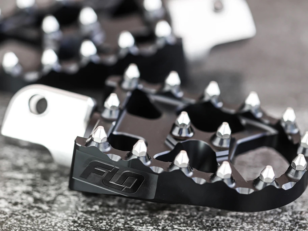 Flo Motorsports V2 MX Footpegs – Black. Fits Softail 2018up Front Rider