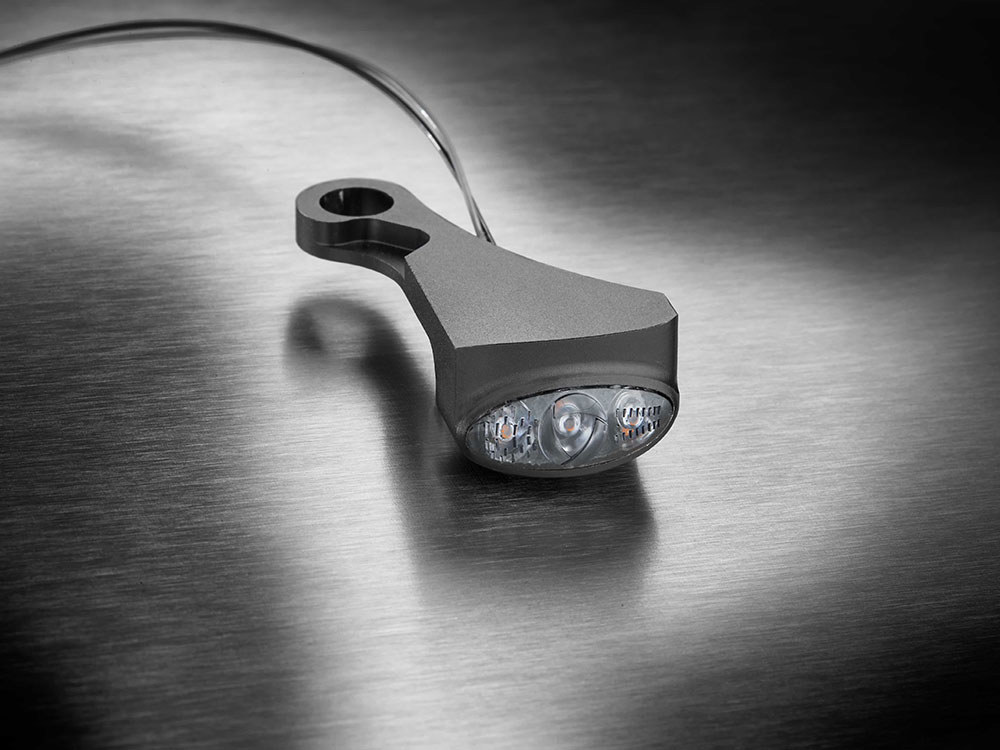 kellermann Dash M Under Perch Turn Signal Left – Black.  Fits Softail 2015-2024 & Touring 2009-2023 Models with Cable Clutch