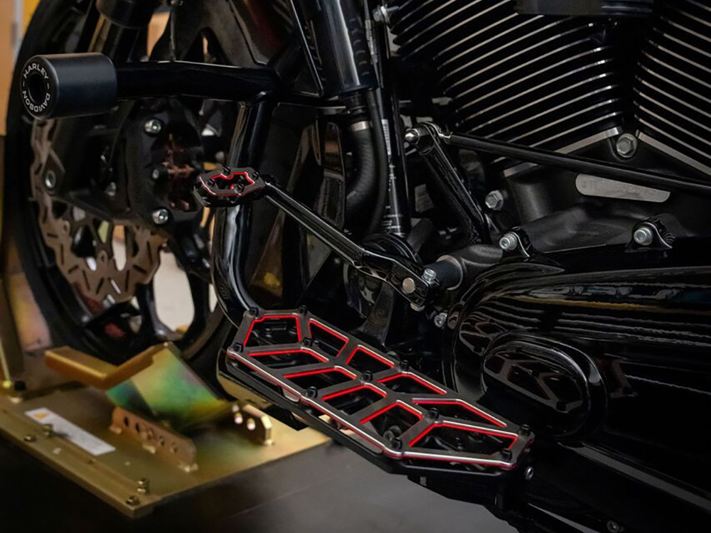 Kodlin NXL Redline FloorBoards – Black, Red & Stainless. Fits Touring 1980up, FL Softail 1986-2017 & Dyna Switchback 2012-2016