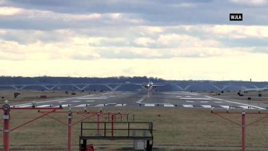 Gusty winds force plane to abort landing at Reagan National in Washington Gusty winds force plane to abort landing at Reagan National in Washington