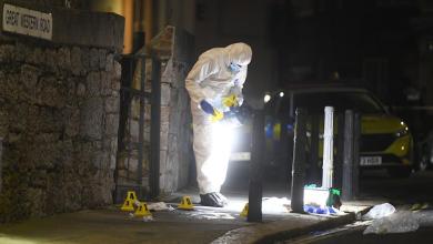 Manhunt for ‘armed and dangerous’ murder suspect after woman found dying in street Manhunt for ‘armed and dangerous’ murder suspect after woman found dying in street