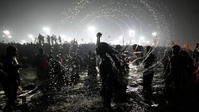 Hindu ascetic rising from the river after a holy dip is emblematic of Maha Kumbh festival in India Hindu ascetic rising from the river after a holy dip is emblematic of Maha Kumbh festival in India