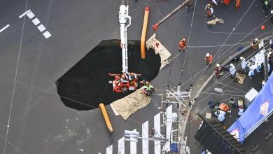 Rescuers race to pull out truck driver stuck in Japan sinkhole for three days Rescuers race to pull out truck driver stuck in Japan sinkhole for three days