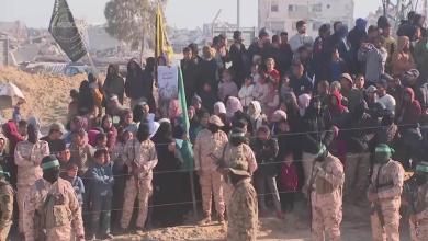 Crowd gathers as militants prepare to release more hostages Crowd gathers as militants prepare to release more hostages