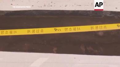 Area closed off after huge sinkhole opens on a Seoul street Area closed off after huge sinkhole opens on a Seoul street