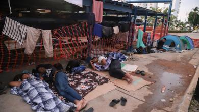 Mexico drops migrants in troubled resort as it disperses them far from US border Mexico drops migrants in troubled resort as it disperses them far from US border