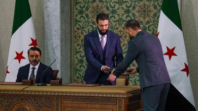 Syrian leader signs constitution that puts the country under an Islamist group’s rule for 5 years Syrian leader signs constitution that puts the country under an Islamist group’s rule for 5 years