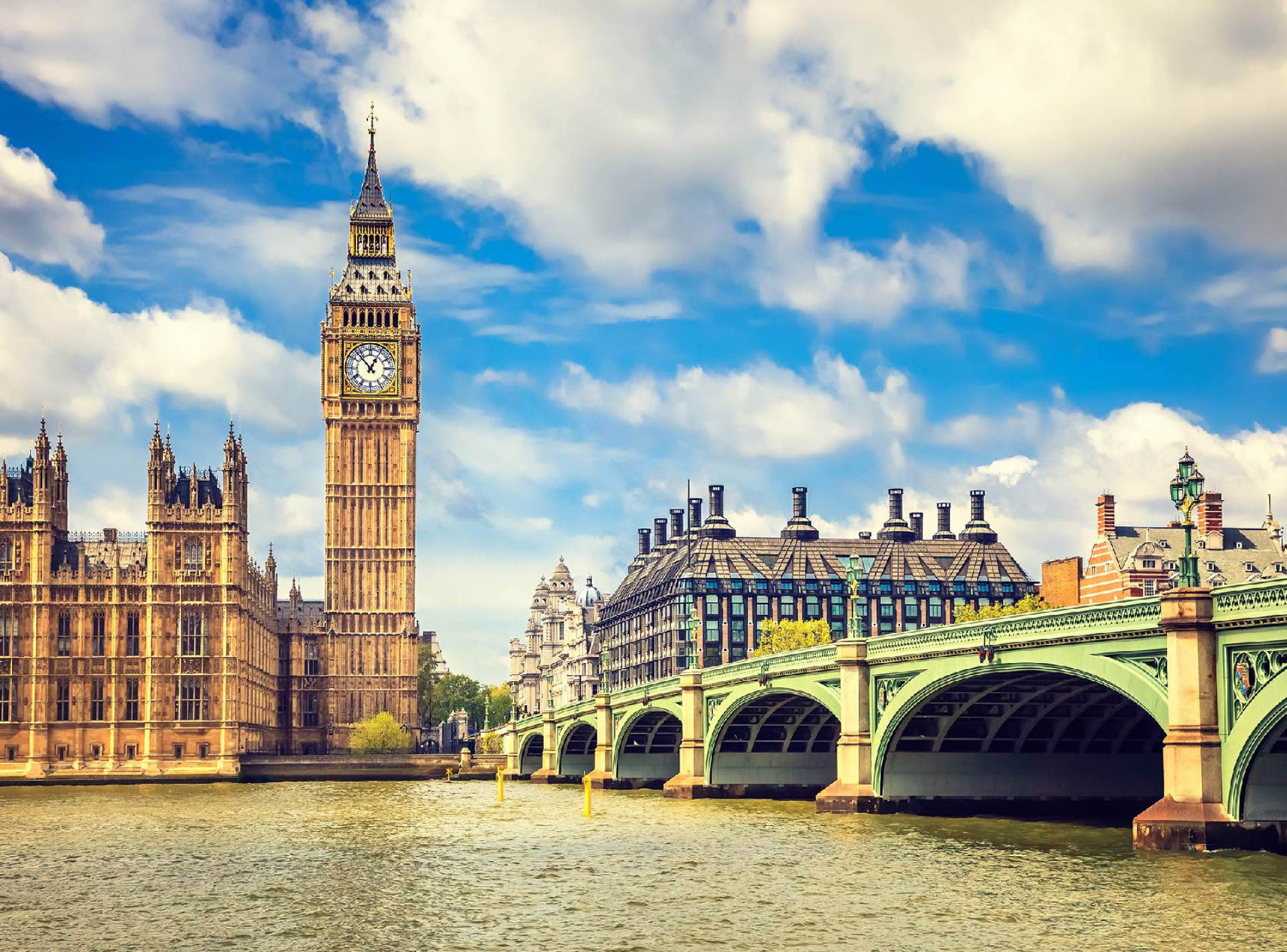 UK landscape featuring rolling green hills, a clear blue sky, and a picturesque countryside scene. UK landscape featuring rolling green hills, a clear blue sky, and a picturesque countryside scene.