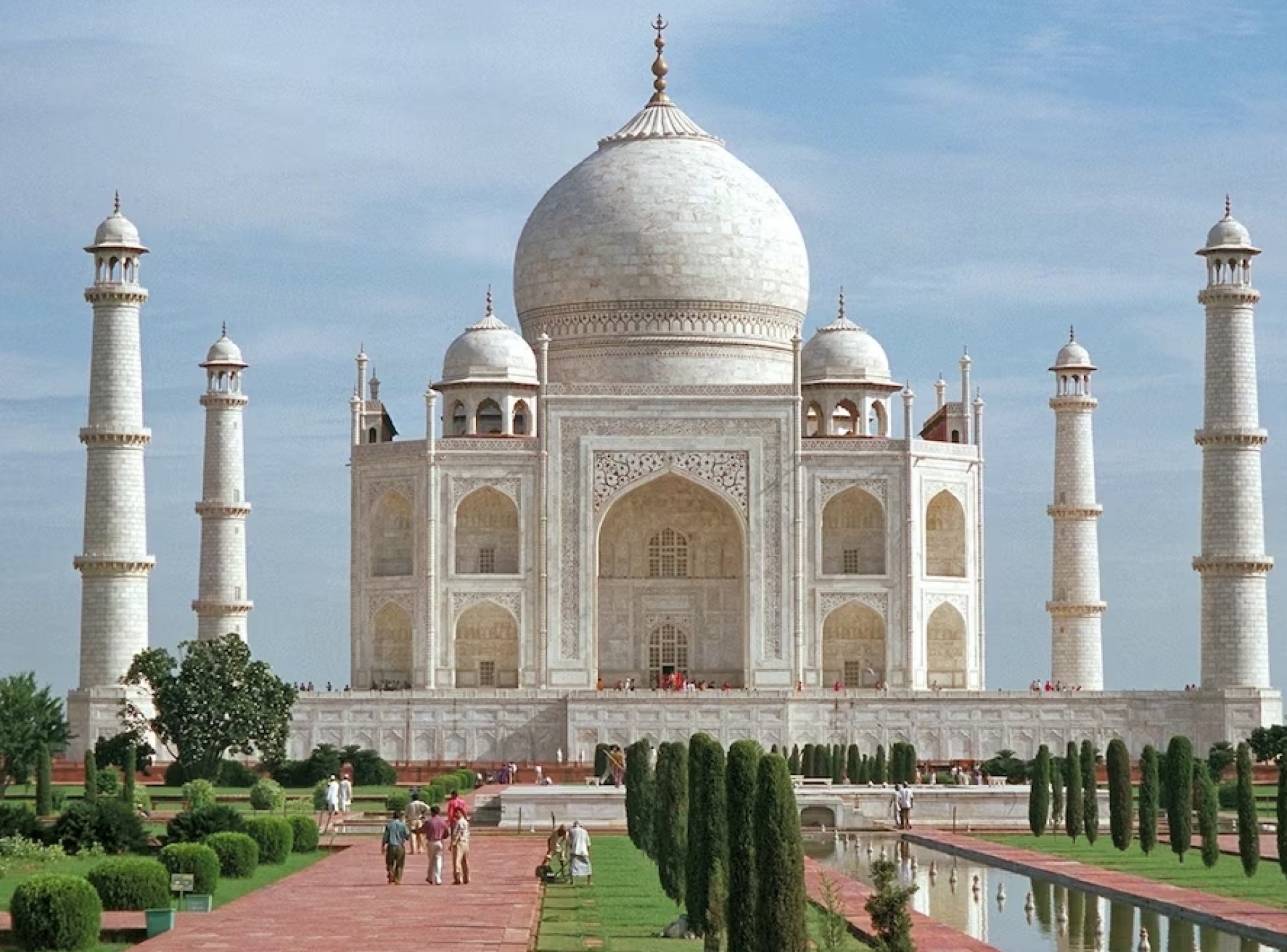 A scenic view of India showcasing vibrant landscapes, cultural elements, and traditional architecture under a clear blue sky. A scenic view of India showcasing vibrant landscapes, cultural elements, and traditional architecture under a clear blue sky.