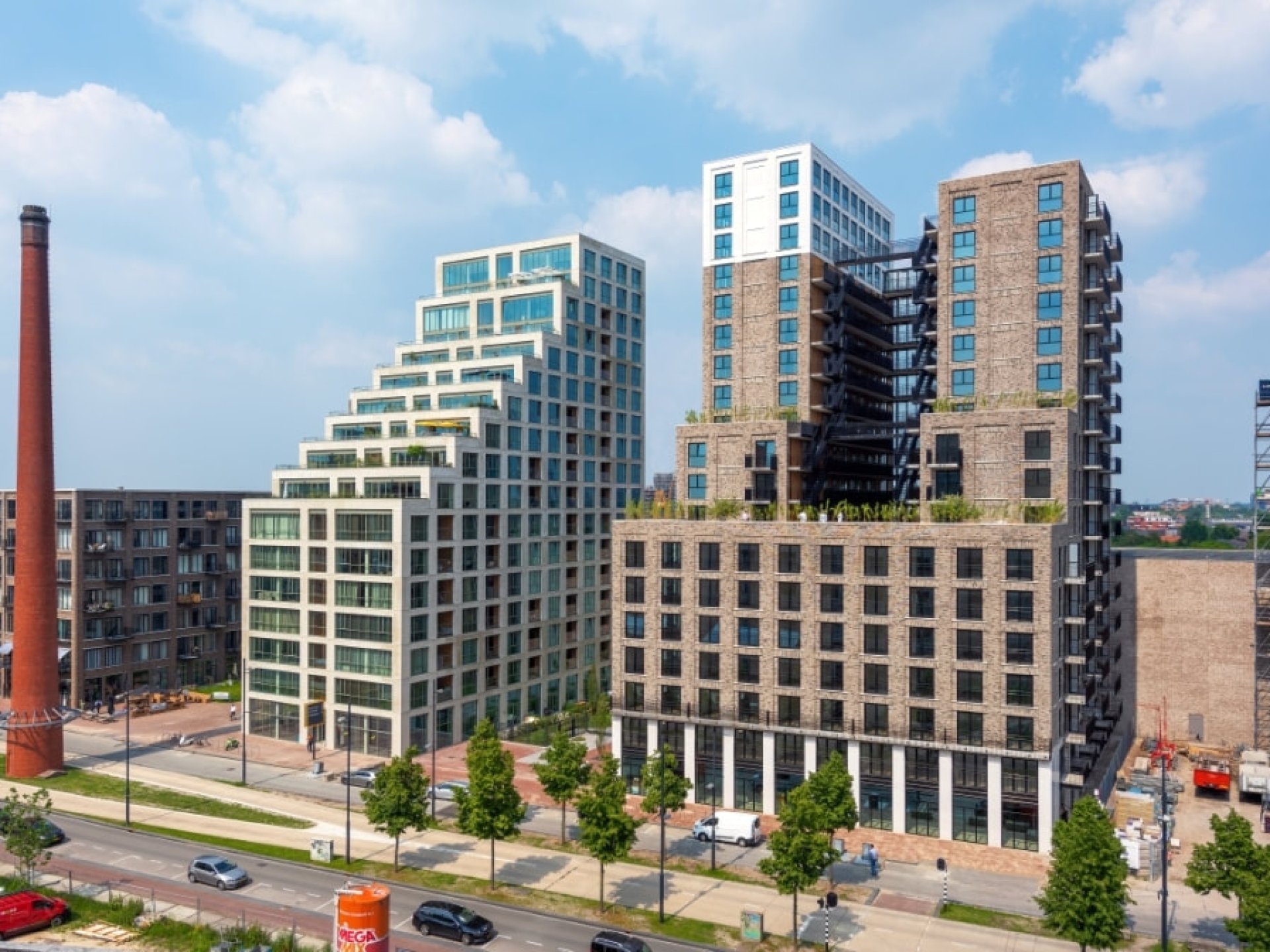 A vibrant view of the Strijp-S district in Eindhoven, showcasing modern architecture and dynamic urban life. A vibrant view of the Strijp-S district in Eindhoven, showcasing modern architecture and dynamic urban life.