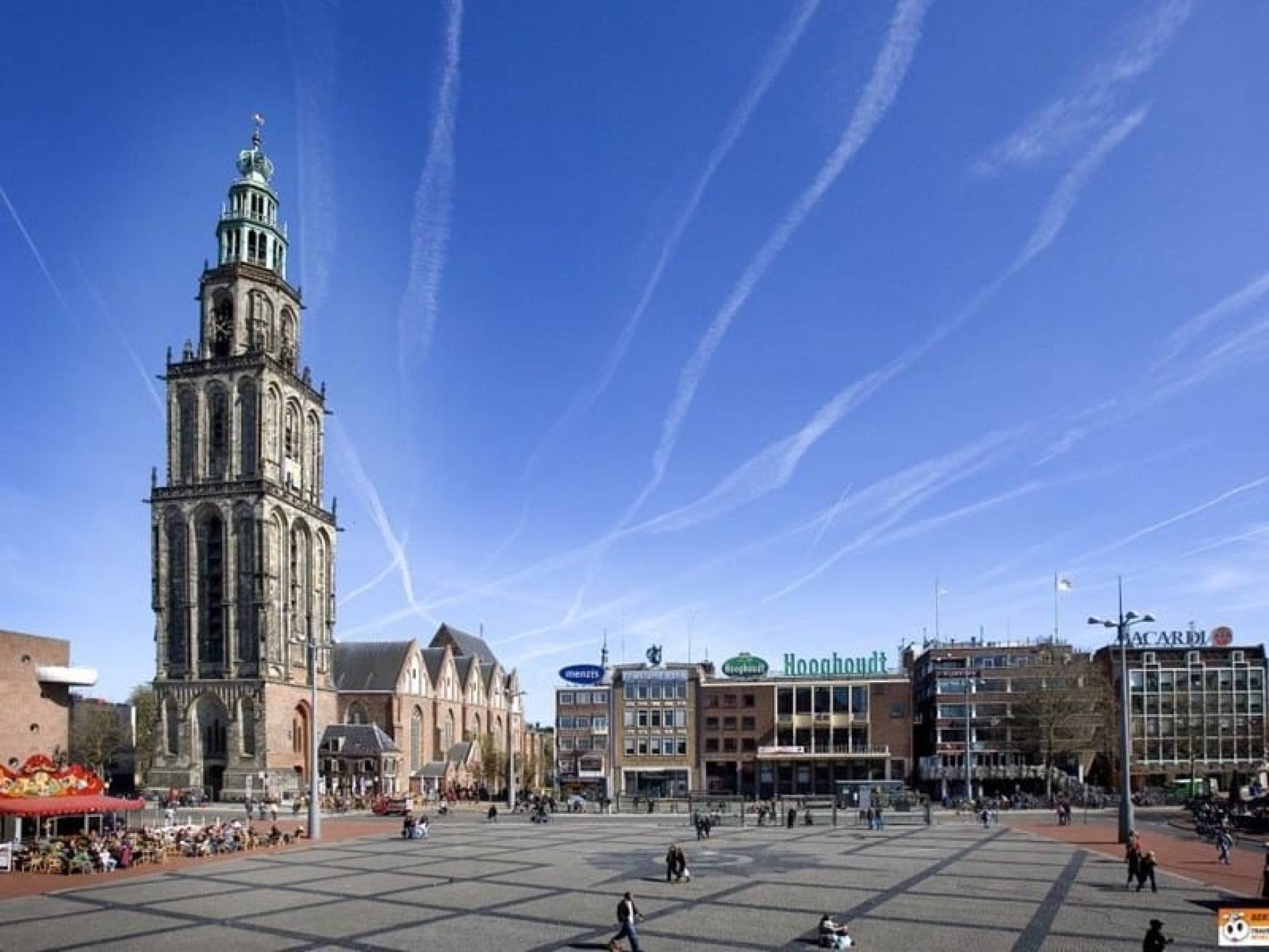 Image of the iconic Martinitoren tower in Groningen, Netherlands, showcasing its historic architecture against a clear blue sky. Image of the iconic Martinitoren tower in Groningen, Netherlands, showcasing its historic architecture against a clear blue sky.
