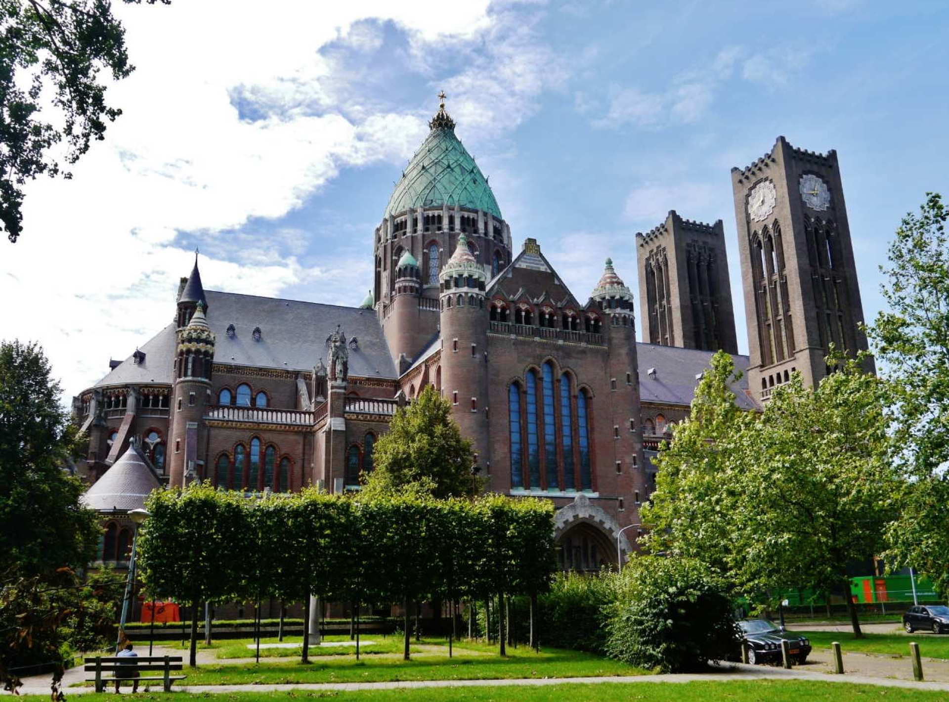 A stunning view of the Grote Kerk or St. Bavo's Church, showcasing its intricate architecture in Haarlem. A stunning view of the Grote Kerk or St. Bavo's Church, showcasing its intricate architecture in Haarlem.