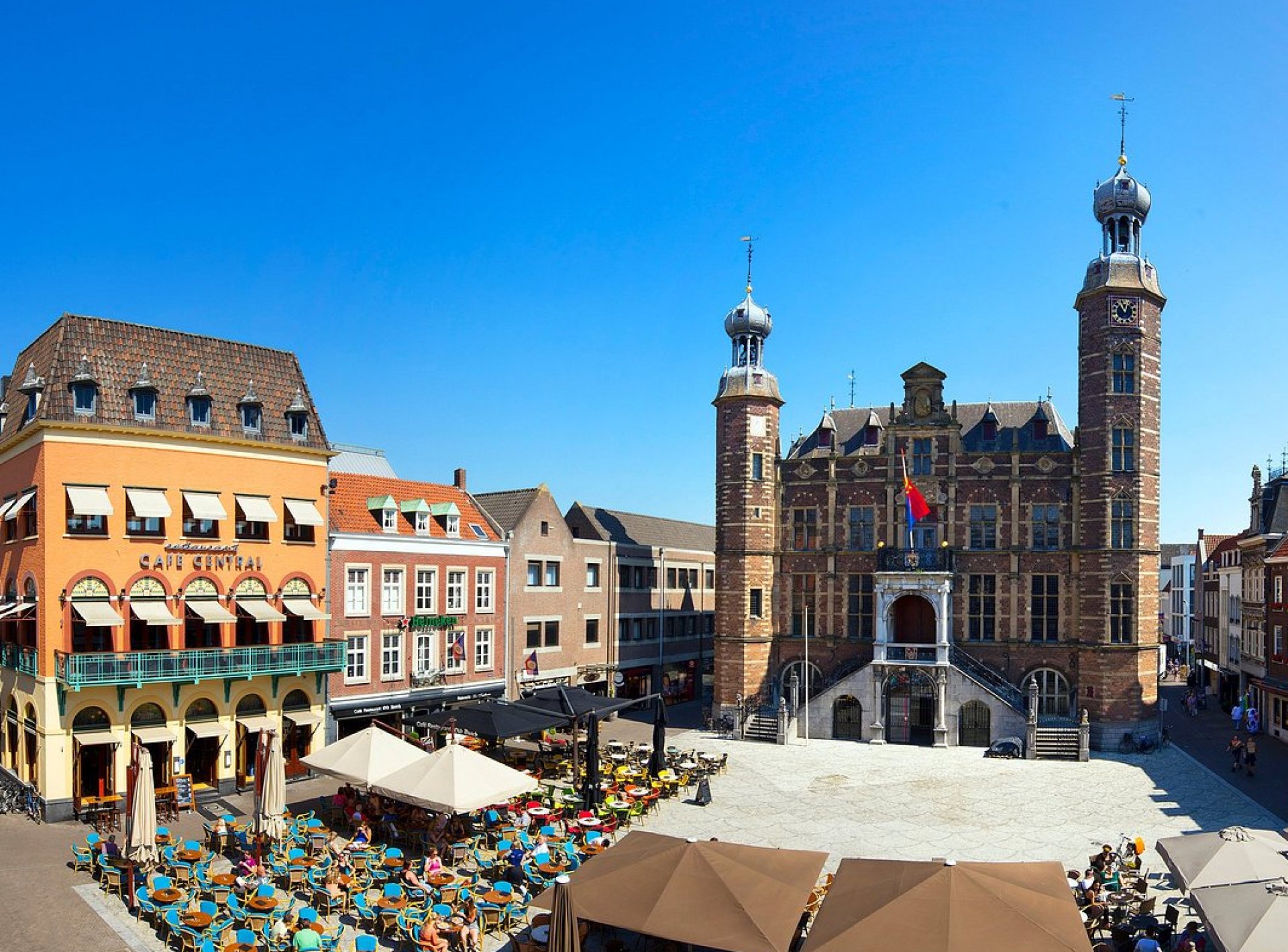 Venlo Market Square bustling with activity, featuring charming architecture and vibrant stalls in the heart of Venlo, Netherlands. Venlo Market Square bustling with activity, featuring charming architecture and vibrant stalls in the heart of Venlo, Netherlands.