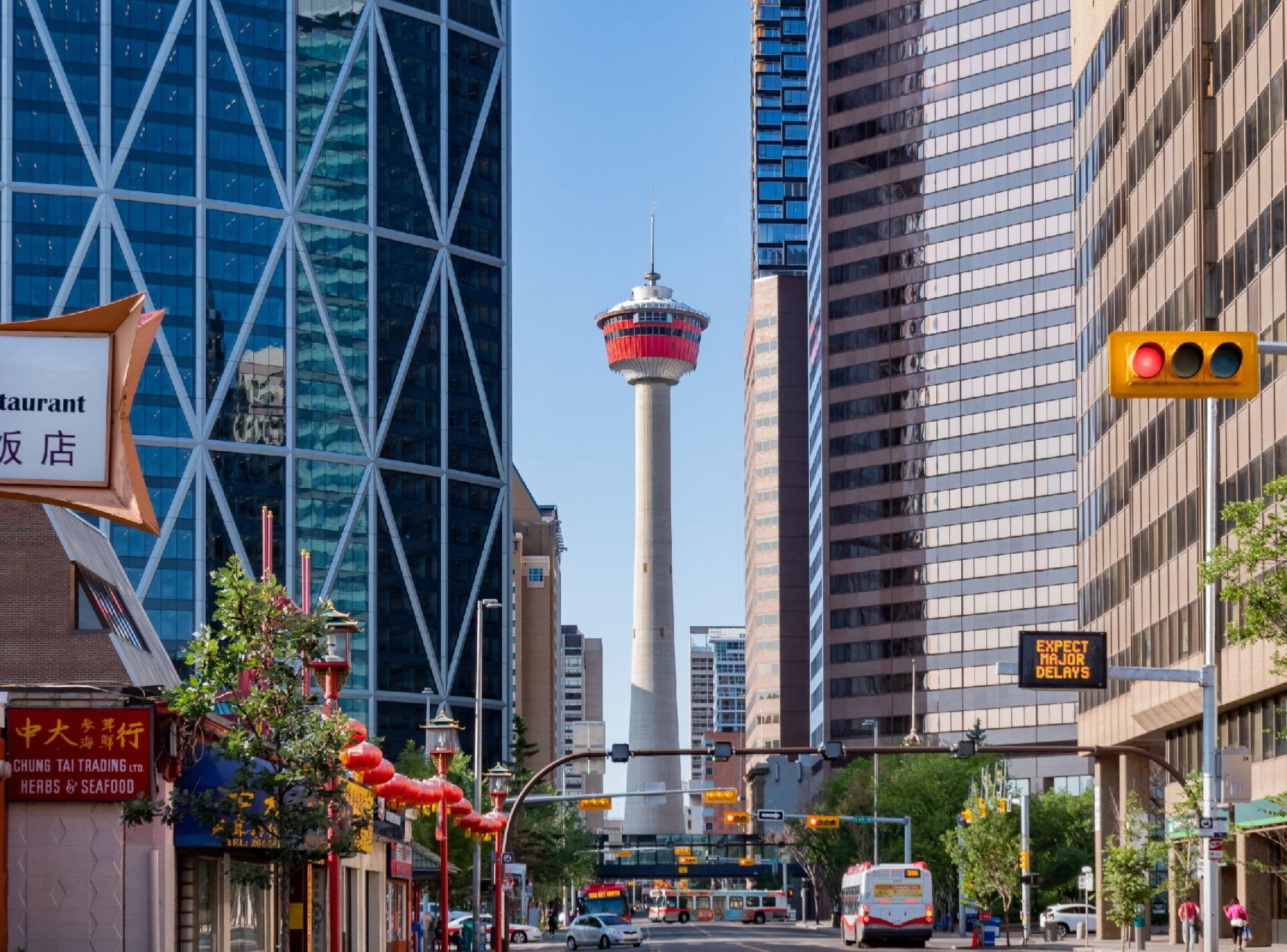 A stunning view of the Calgary Tower against a clear blue sky, showcasing the iconic skyline of Calgary, Canada. A stunning view of the Calgary Tower against a clear blue sky, showcasing the iconic skyline of Calgary, Canada.
