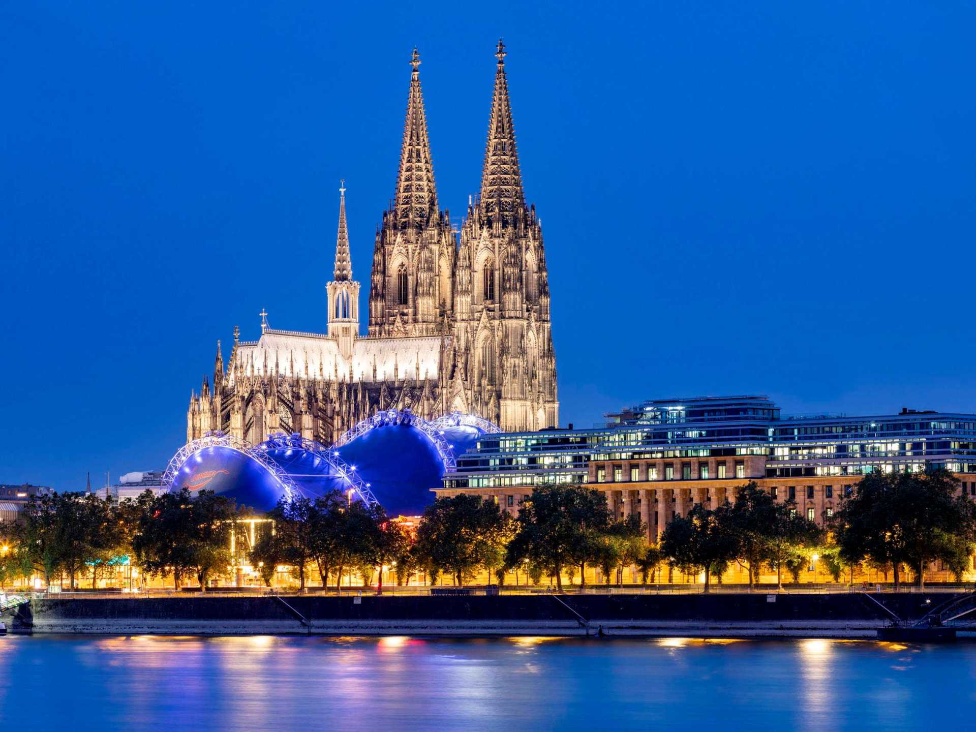 A stunning view of the Cologne Cathedral, an iconic landmark showcasing Gothic architecture in the heart of Cologne. A stunning view of the Cologne Cathedral, an iconic landmark showcasing Gothic architecture in the heart of Cologne.