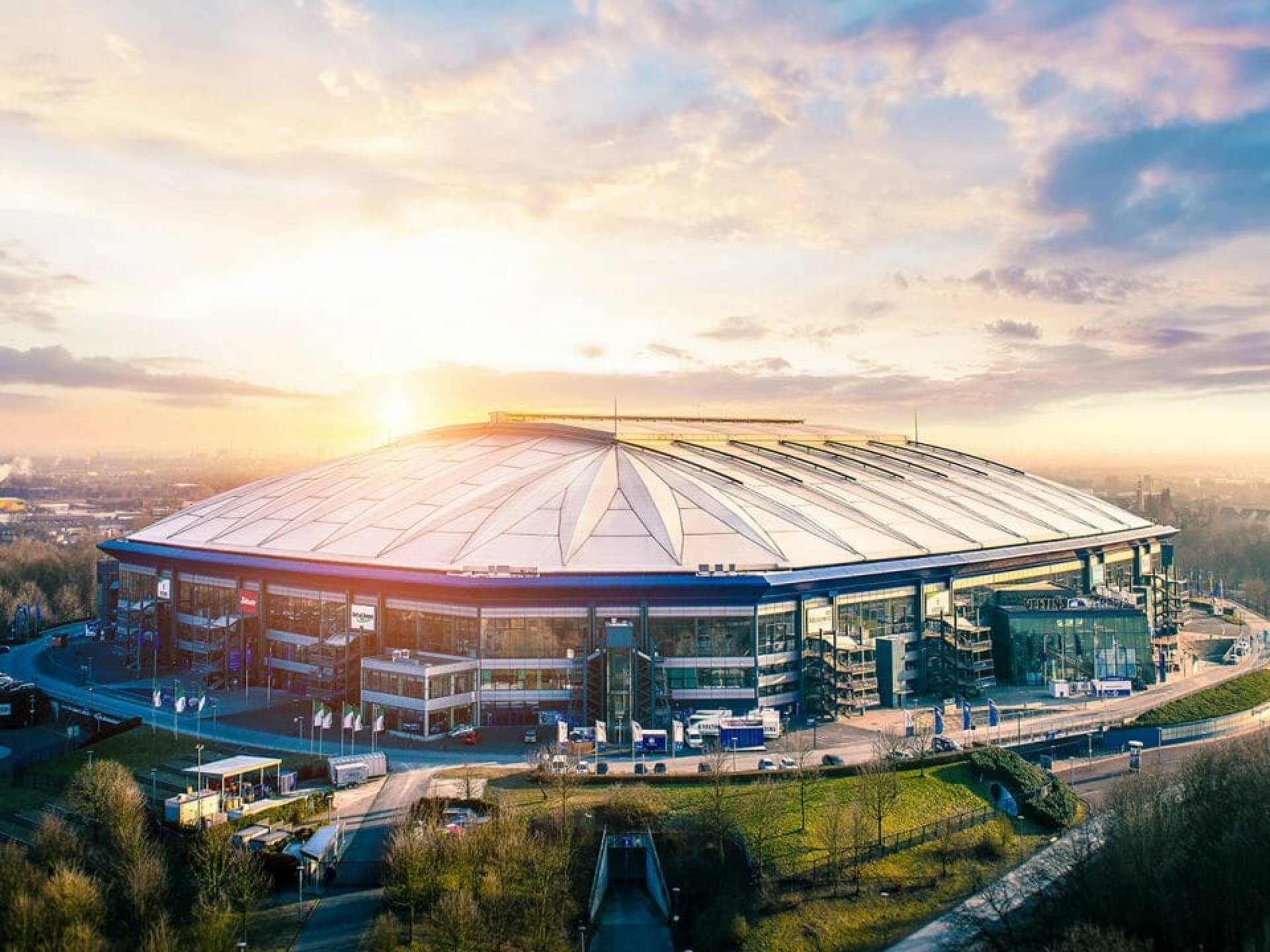 Stadium view of the Veltins Arena in Gelsenkirchen, showcasing its impressive architecture and vibrant atmosphere. Stadium view of the Veltins Arena in Gelsenkirchen, showcasing its impressive architecture and vibrant atmosphere.
