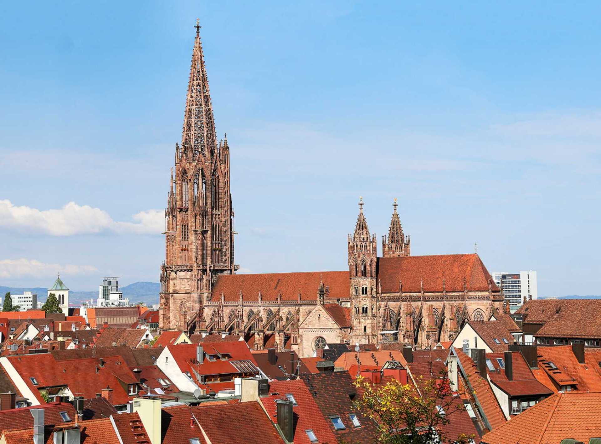 A stunning view of Freiburg Cathedral showcasing its intricate architecture in Freiburg im Breisgau. A stunning view of Freiburg Cathedral showcasing its intricate architecture in Freiburg im Breisgau.
