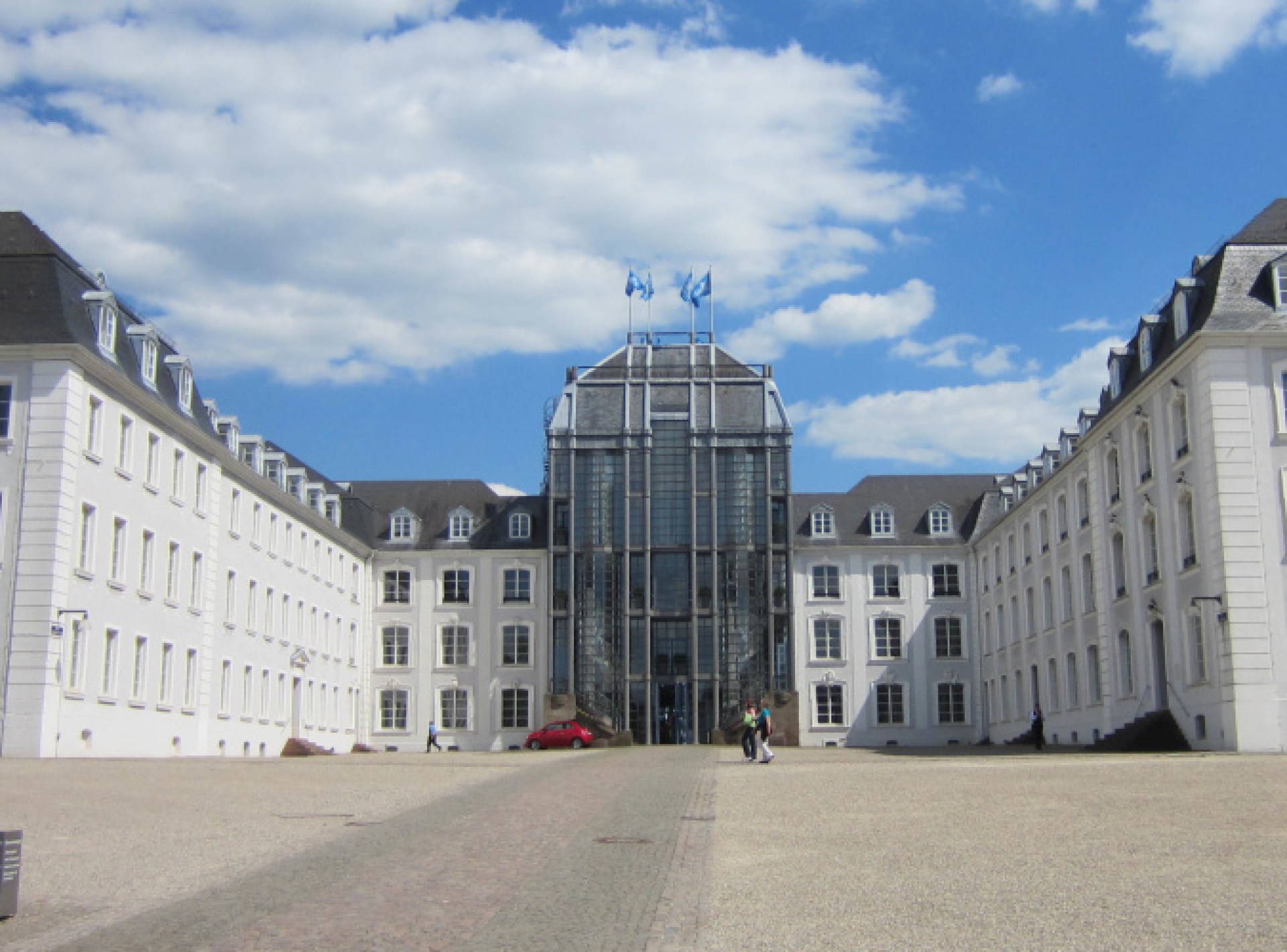 A picturesque view of Saarbrucken Castle, showcasing its stunning architecture and surrounding landscape in Saarbrucken, Germany. A picturesque view of Saarbrucken Castle, showcasing its stunning architecture and surrounding landscape in Saarbrucken, Germany.
