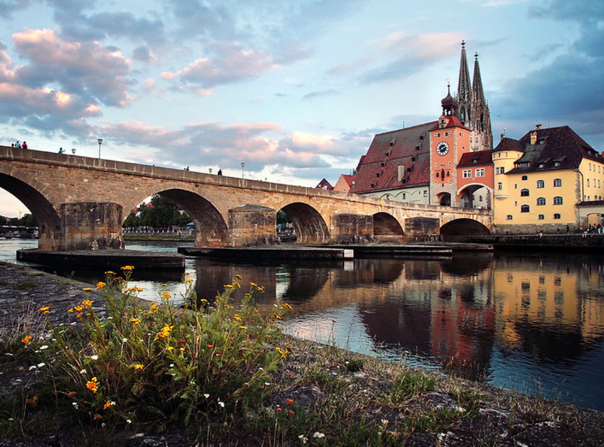 Stone Bridge over the Danube River in Regensburg, showcasing stunning medieval architecture and scenic city views. Stone Bridge over the Danube River in Regensburg, showcasing stunning medieval architecture and scenic city views.