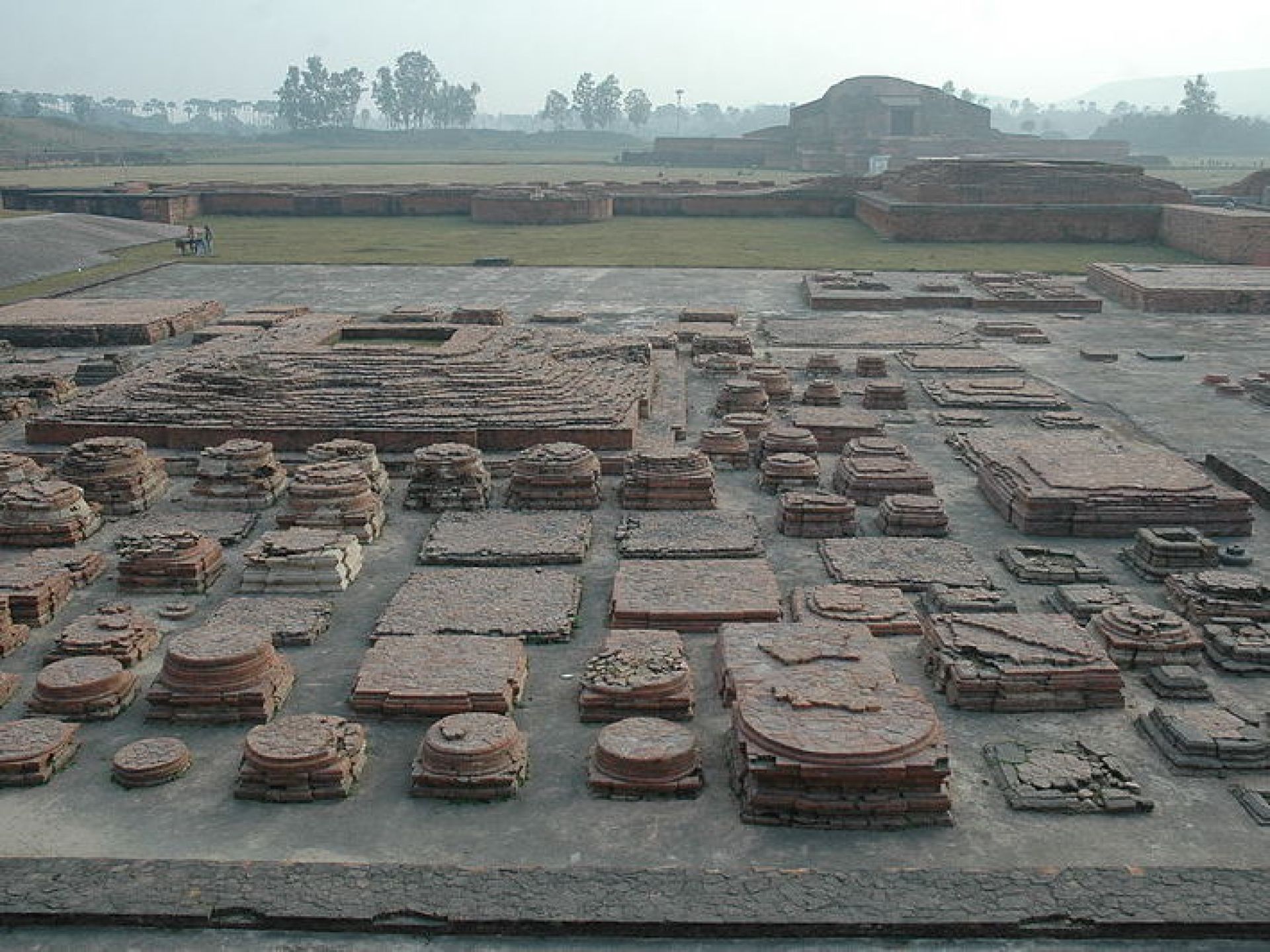 Vikramshila ruins showcasing ancient architecture in Bhagalpur, India, surrounded by lush greenery and historical significance. Vikramshila ruins showcasing ancient architecture in Bhagalpur, India, surrounded by lush greenery and historical significance.
