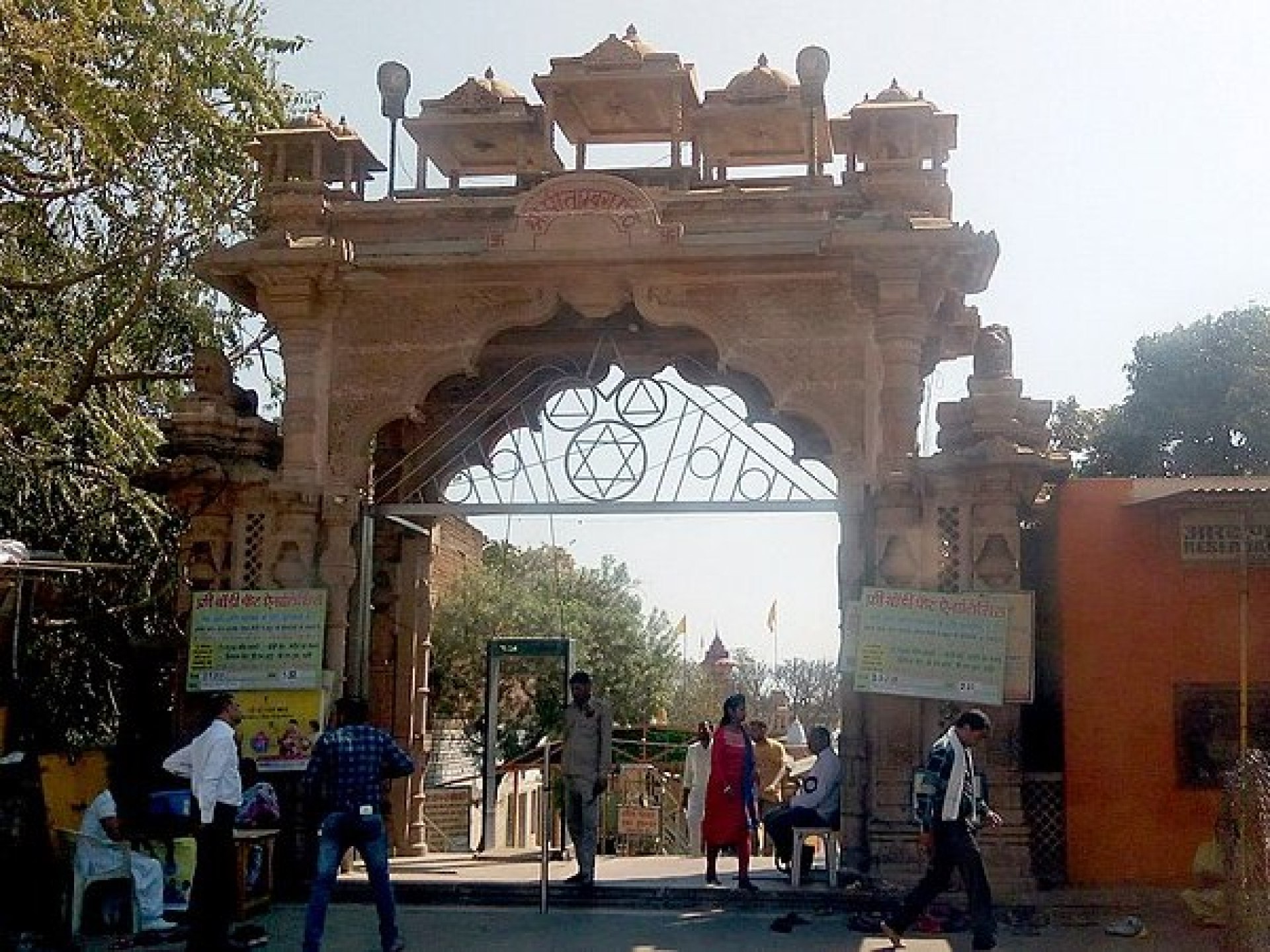 Image of the Shri Peetambra Peetha gate in Datia, showcasing its intricate design and vibrant colors amidst a serene backdrop. Image of the Shri Peetambra Peetha gate in Datia, showcasing its intricate design and vibrant colors amidst a serene backdrop.