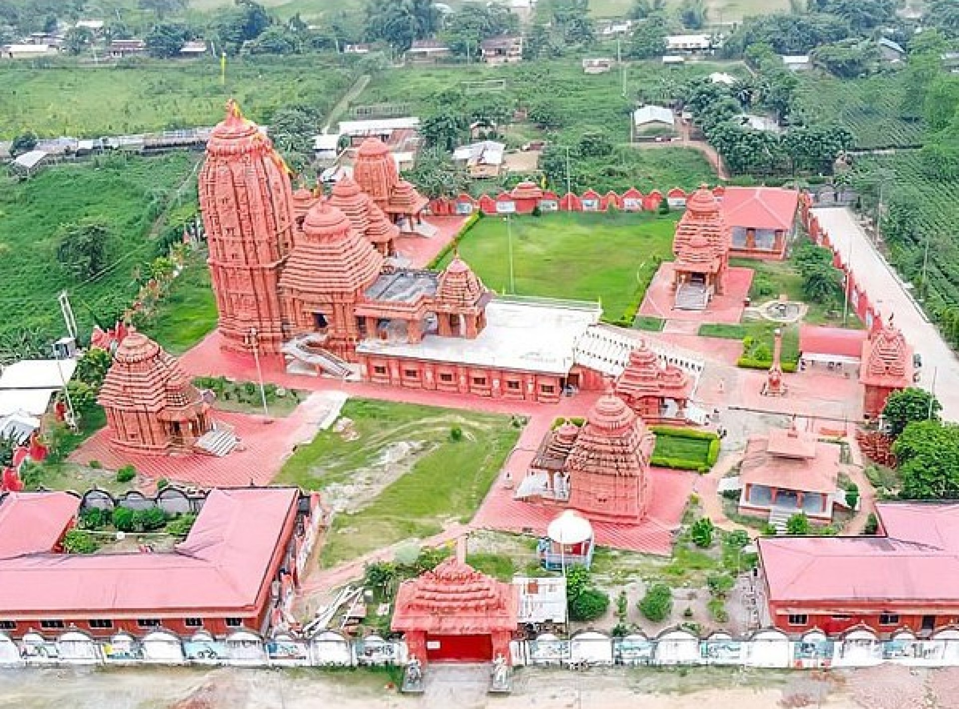 A view of the Jagannath Temple in Dibrugarh, showcasing its intricate architecture and serene surroundings. A view of the Jagannath Temple in Dibrugarh, showcasing its intricate architecture and serene surroundings.