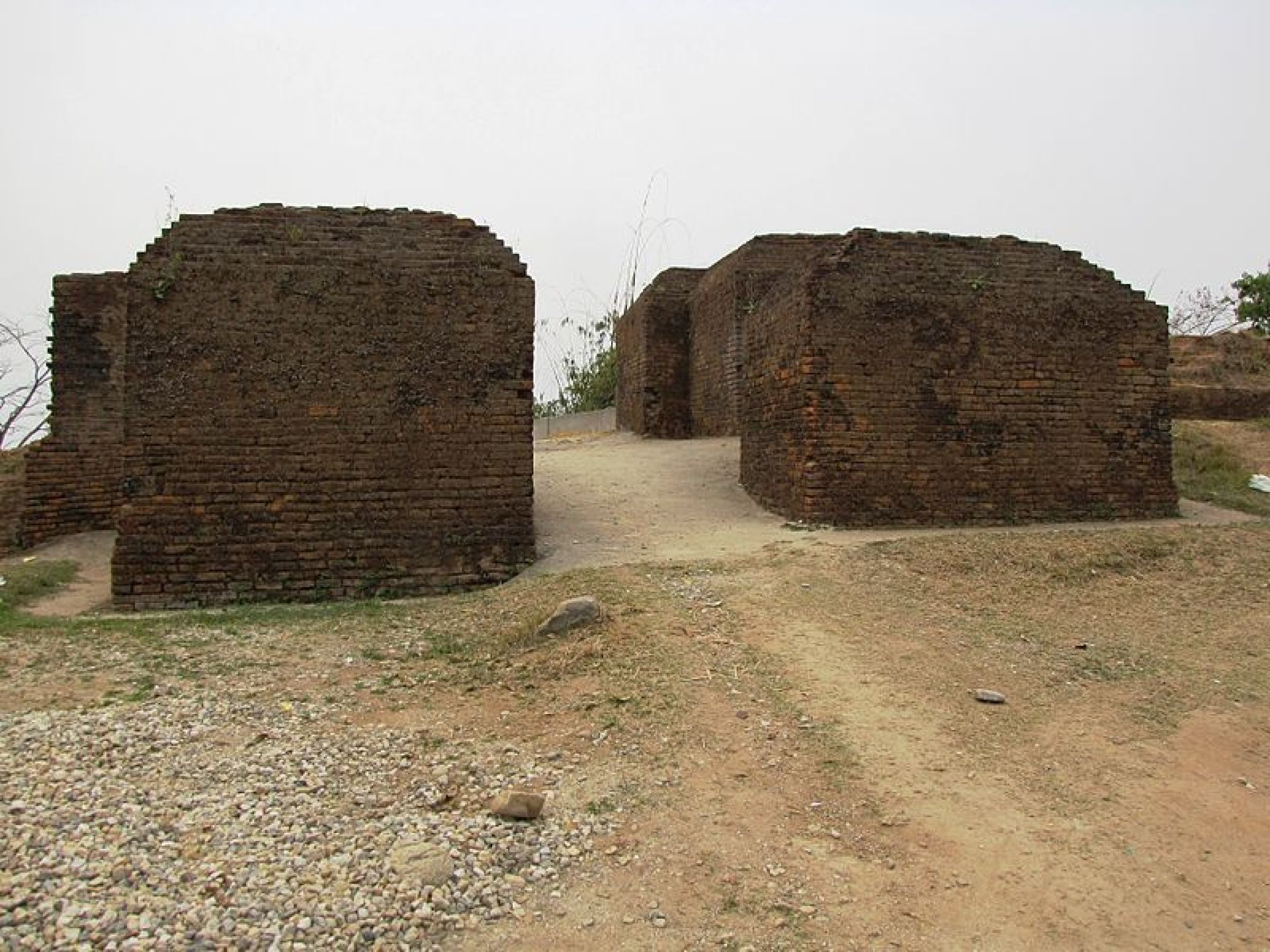 Historic Ita Fort in Itanagar, showcasing ancient architecture and lush greenery surrounding the site. Historic Ita Fort in Itanagar, showcasing ancient architecture and lush greenery surrounding the site.