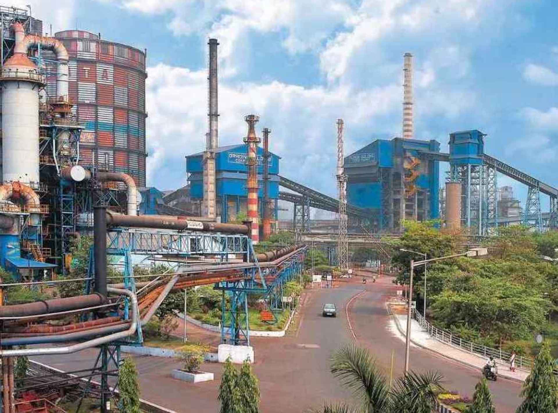 Aerial view of the Tata Steel plant in Jamshedpur, showcasing the extensive industrial complex and surrounding greenery. Aerial view of the Tata Steel plant in Jamshedpur, showcasing the extensive industrial complex and surrounding greenery.