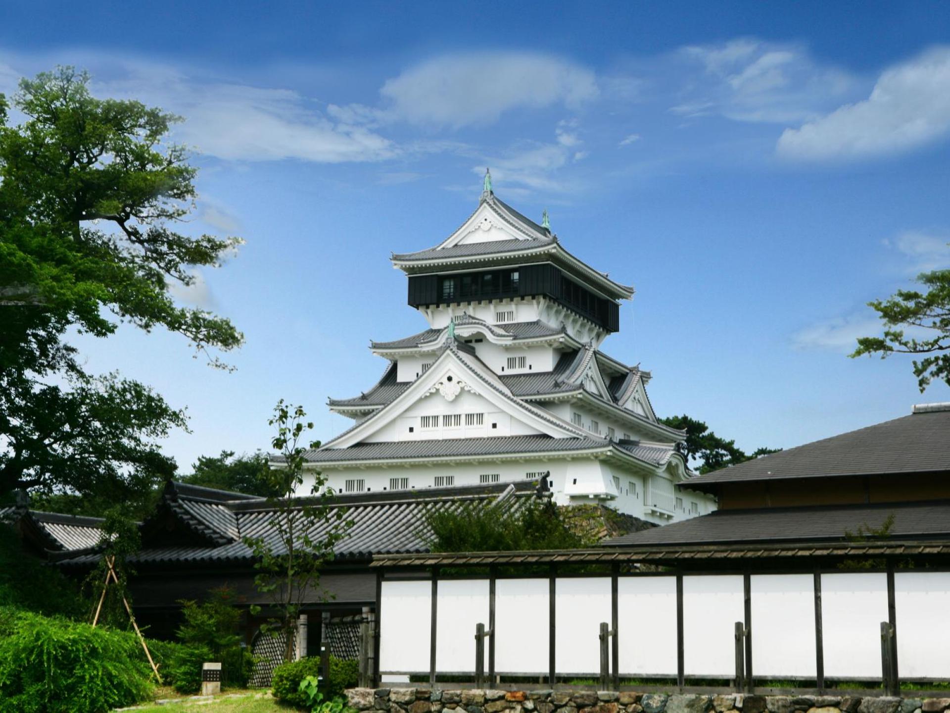 A scenic view of Kokura Castle in Kitakyushu, showcasing the historic architecture amid lush greenery. A scenic view of Kokura Castle in Kitakyushu, showcasing the historic architecture amid lush greenery.