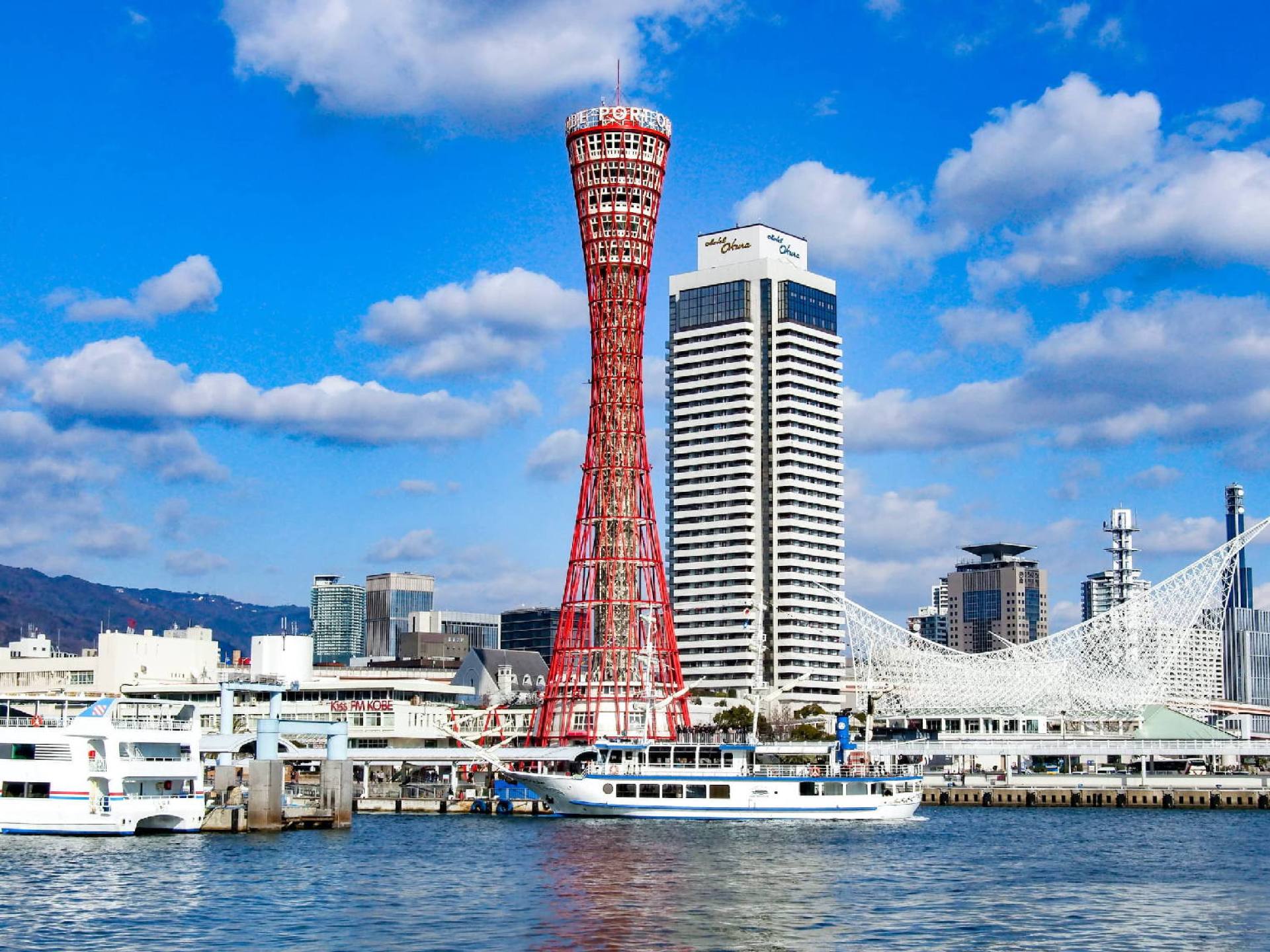 View of the iconic Port Tower and vibrant harbor area in Kobe, Japan, showcasing the city’s stunning waterfront attractions. View of the iconic Port Tower and vibrant harbor area in Kobe, Japan, showcasing the city’s stunning waterfront attractions.