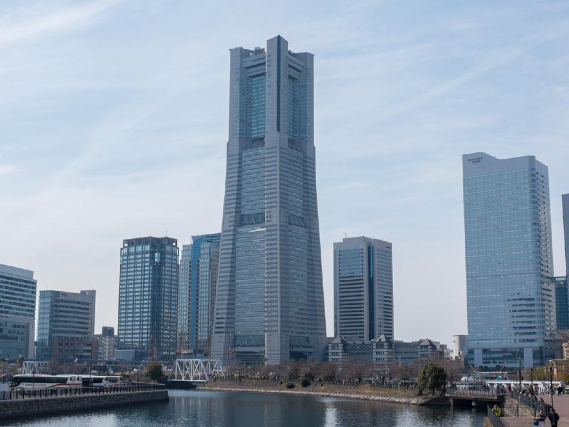 View of the iconic Landmark Tower in Yokohama, showcasing its impressive architecture against the skyline. View of the iconic Landmark Tower in Yokohama, showcasing its impressive architecture against the skyline.
