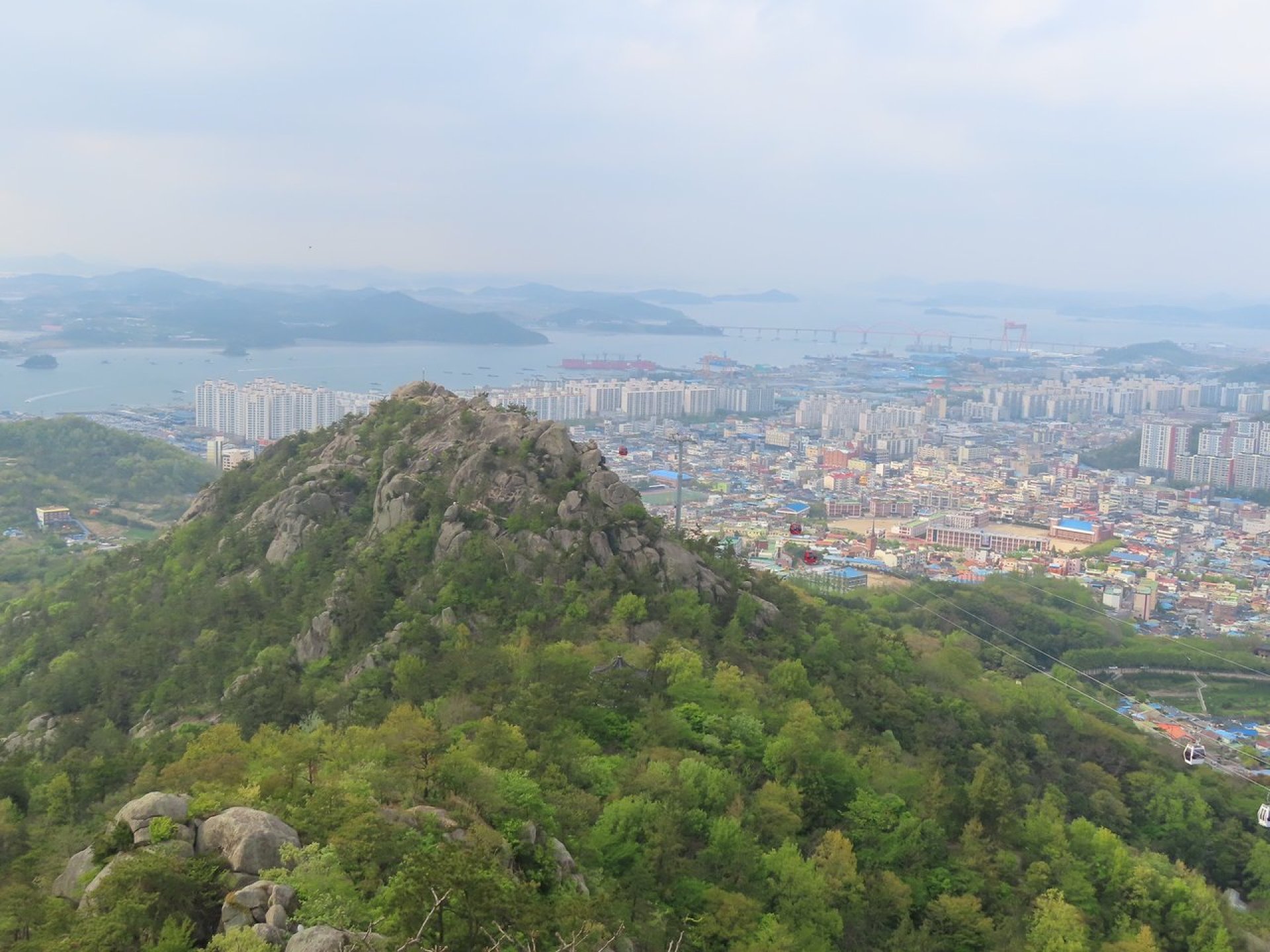 Scenic view of Yudal Mountain in Mokpo, South Korea, showcasing lush greenery and clear skies. Scenic view of Yudal Mountain in Mokpo, South Korea, showcasing lush greenery and clear skies.