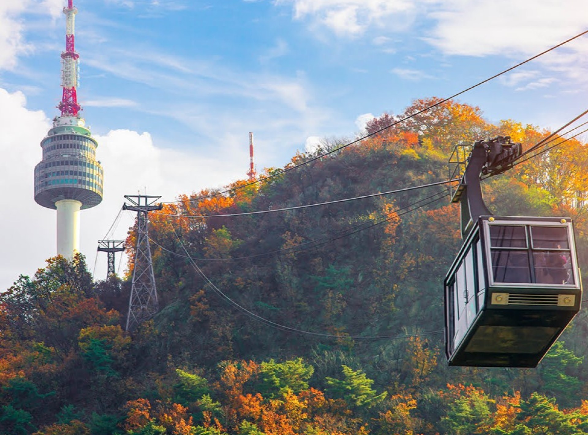 Seoul's iconic N Seoul Tower stands tall against the skyline, showcasing the vibrant energy of the city. Seoul's iconic N Seoul Tower stands tall against the skyline, showcasing the vibrant energy of the city.