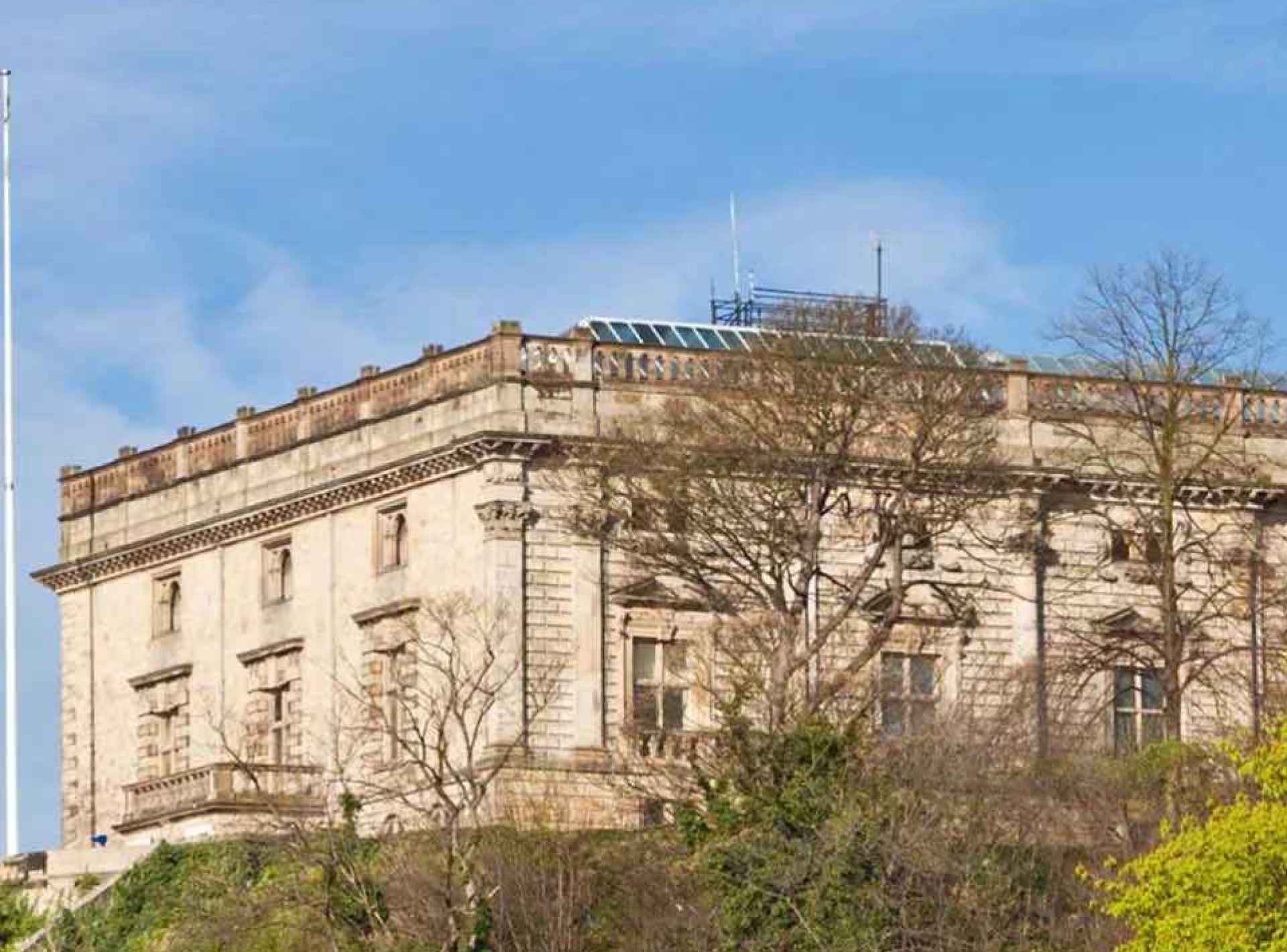 Nottingham Castle stands majestically, showcasing historic architecture amidst lush greenery in Nottingham. Nottingham Castle stands majestically, showcasing historic architecture amidst lush greenery in Nottingham.